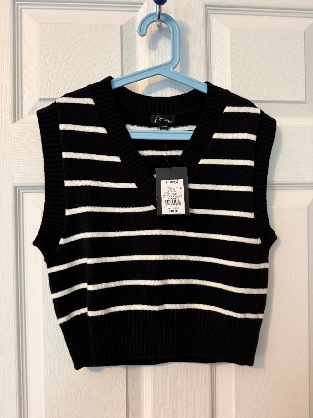 Slightly cropped sweater vest